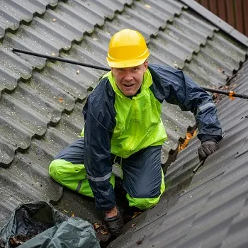 Our gutter cleaning nashville is the best, Our professional gutter cleaner in Nashville, TN, equipped with tools for expert gutter cleaning service.