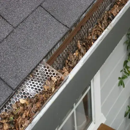 This photo shows a blocked gutter with leaf which needs gutter cleaning nashville, TN